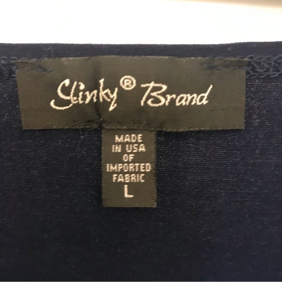 Slinky L” shark bite Navy blue blouse loose fitting comfortable and stylish NWOT - Picture 2 of 5